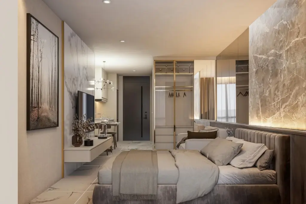 Studio Condo for Sale at Avenue Boutique Pattaya bedroom with grey sofa, TV and marble accent wall