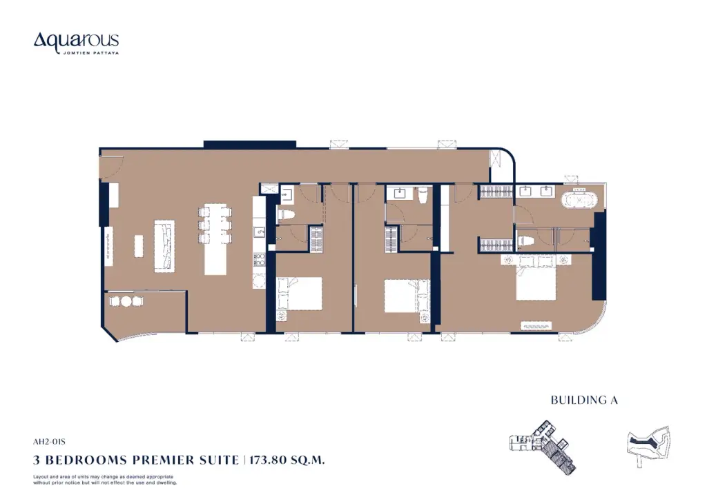 3 Bedroom Condo for Sale at Aquarous Jomtien Pattaya open-plan living room with tufted sofa and kitchen island with bar stools