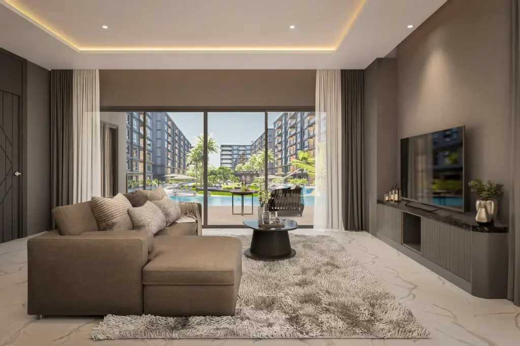 3 Bedroom Condo for Sale at Zenith 2 living room with sectional sofa and pool view through glass doors