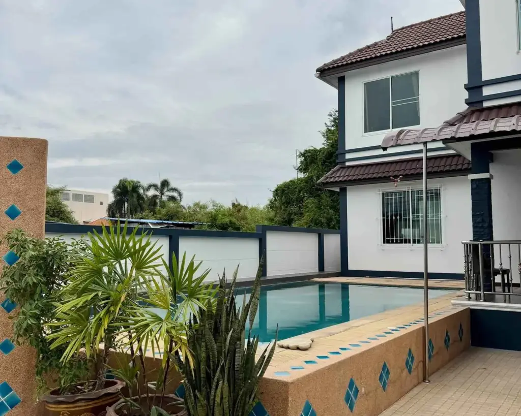 3 Bedroom House for Rent in Nong Prue two-story home with private pool, tropical plants, and terrace
