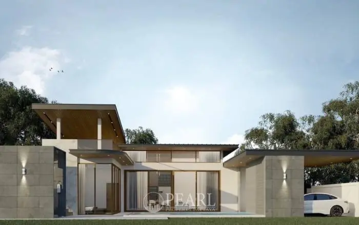 Grand Breeze Luxury Pool Villas Pattaya: Modern villa exterior with large glass doors, a flat roof, and a covered carport with a white car.