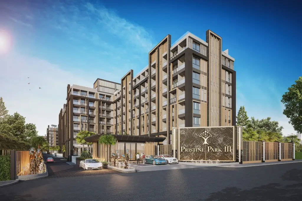 Pristine Park 3 modern condo building exterior with entrance, cars, and a large sign on a sunny day.
