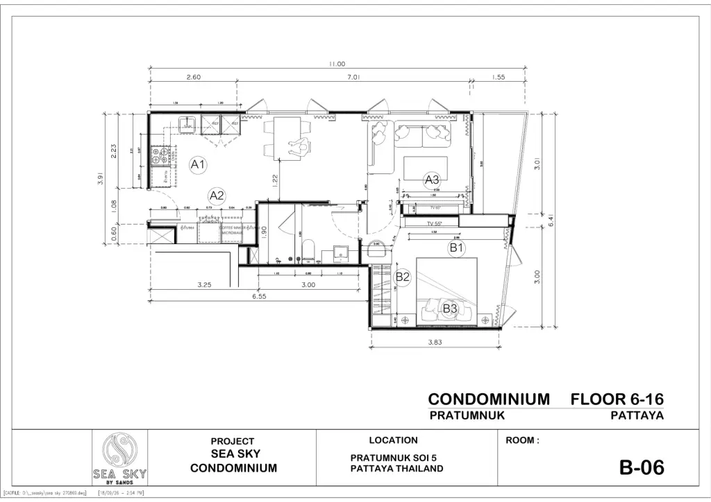1 Bedroom Condo for Sale at Sea Sky By Sand living room with sectional sofa, city view windows and modern art