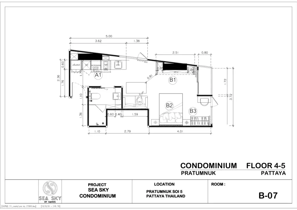 1 Bedroom Condo for Sale at Sea Sky By Sand living room with sectional sofa, floral accents and city view window