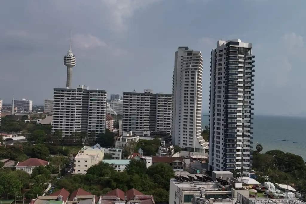 1 Bedroom Condo for Sale at Sea Sky By Sand aerial view of Pattaya high-rise towers and coastline