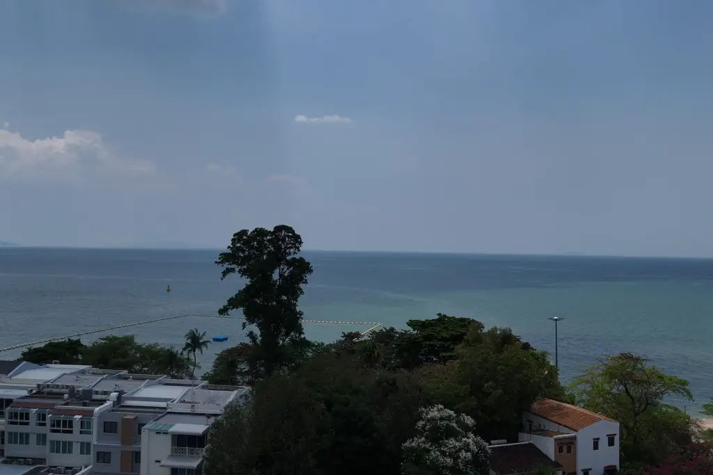 1 Bedroom Condo for Sale at Sea Sky By Sand balcony view of Pattaya coastline and sea horizon