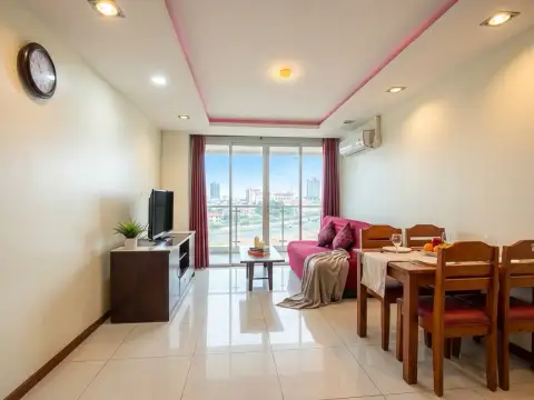 1 Bedroom Condo for Sale at Hyde Park Residence 2 living room with pink accents, dining table, and balcony view