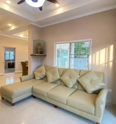 3 Bedroom House for Sale in East Pattaya cream sectional sofa with cushions near bright window