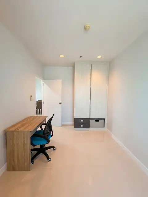 2 Bedroom Condo for Sale at Centric Sea study nook with desk, chair, and built-in wardrobe