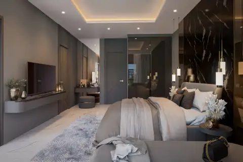 3 Bedroom Condo for Sale at Zenith 2 living room with large L-shaped sofa, TV, and balcony view of pool and buildings.