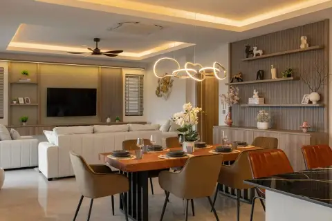 3 Bedroom House for Sale at Zensiri Lakeside Pool Villas dining area with wood live-edge table, designer pendant light, and TV lounge