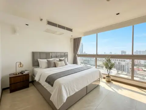 2 Bedroom Condo for Sale at Northshore Pattaya bright bedroom with city skyline view through large windows