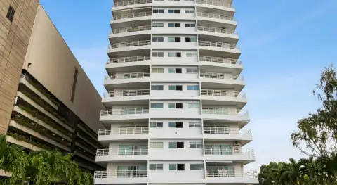 View Talay 6 angled view of white high-rise balconies with adjacent parking structure