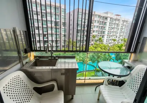 2 Bedroom Condo for Sale at Dusit Grand Park 1 balcony with sink, seating and pool view