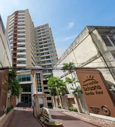 Sriracha Condo View building signage and glass lobby entrance with twin residential towers