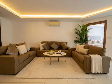 2 Bedroom Condo for Sale at Laguna Beach Resort 3 (The Maldives) U-shaped sofa seating around oval coffee table on cozy rug