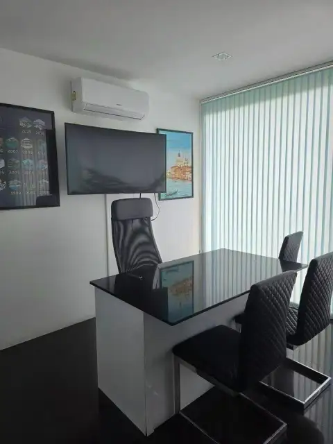 1 Bedroom Condo for Sale at Club Royal office-style seating area with desk, chairs, and wall art