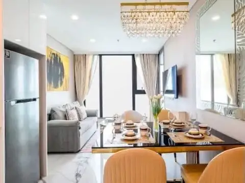 2 Bedroom Condo for Rent at Copacabana Beach Jomtien dining area with crystal chandelier and sea view