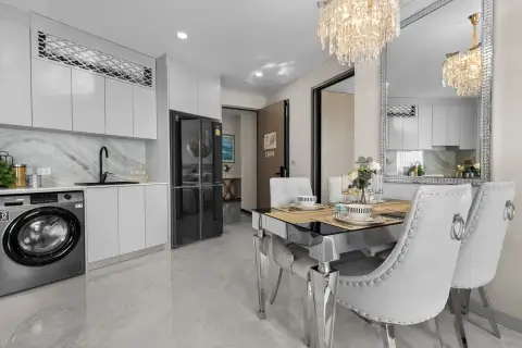 1 Bedroom Condo for Sale at Copacabana Coral Reef kitchenette with dining table, mirror and chandelier