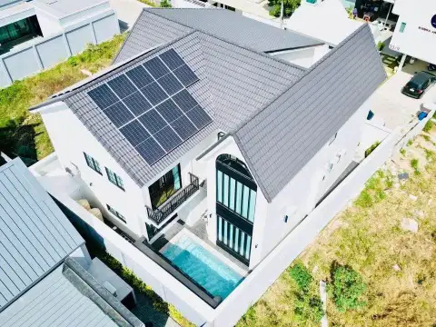 3 Bedroom House for Sale & Rent in East Pattaya rooftop view showing solar panels, tiled roof, and private pool below