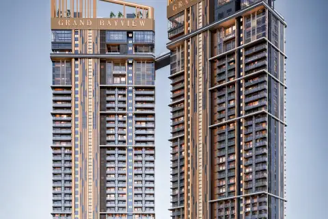 Grand Bay View close-up facade view of twin high-rise condo towers with balconies