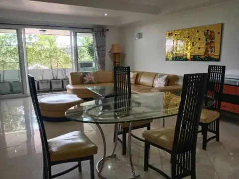 3 Bedroom Condo for Sale at Grand Condotel open dining and living space with balcony view