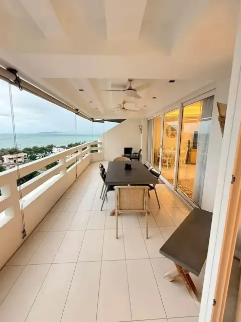 1 Bedroom Condo for Sale at Grand Condotel spacious balcony with dining table and ocean view