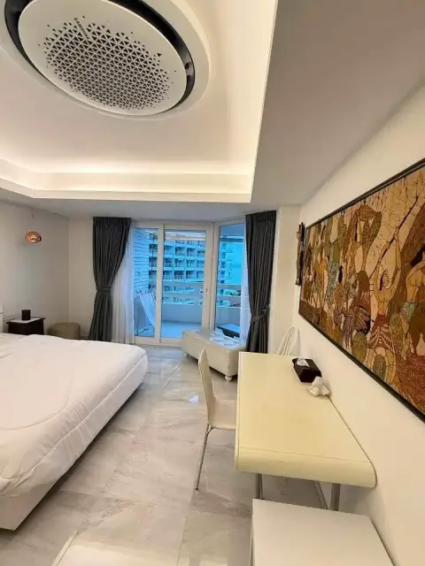 1 Bedroom Condo for Sale at Grand Condotel bedroom with balcony access and city view