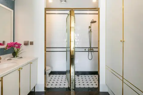 1 Bedroom Condo for Sale at Grand Florida Beachfront Condo Resort Pattaya bathroom with glass shower and patterned tile flooring