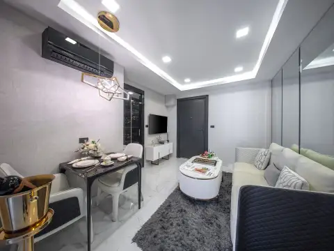 1 Bedroom Condo for Sale at Grand Solaire Noble kitchen counter with stove, cookware and mirrored backsplash