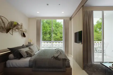 1 Bedroom Condo for Sale at Harmonia City Garden bedroom with gray bedding, wall-mounted TV and sliding door to poolside balcony