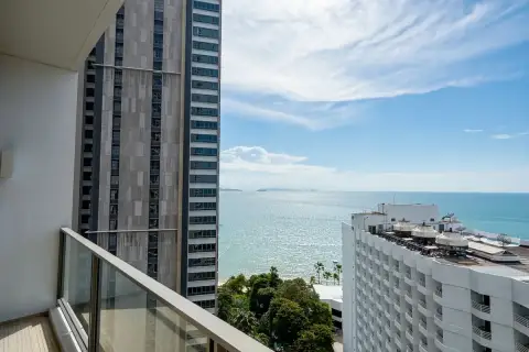 1 Bedroom Condo for Rent at Northpoint balcony with glass railing offering open sea and city tower views