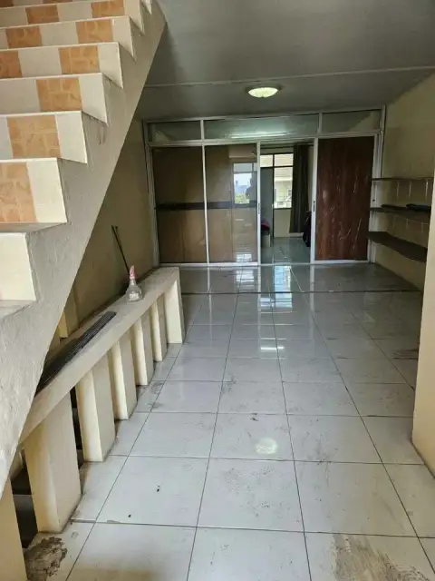 3 Bedroom House for Sale in Jomtien open tiled hallway leading to staircase and glass doors