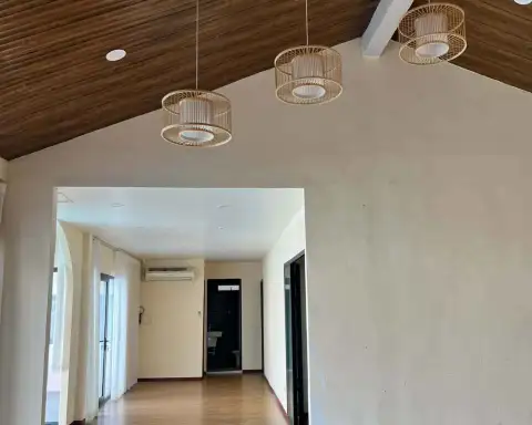 5 Bedroom House for Rent in Jomtien vaulted wooden ceiling with pendant lights over hallway