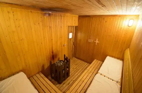 Dormy Residences Sriracha traditional wooden sauna room with bench seating
