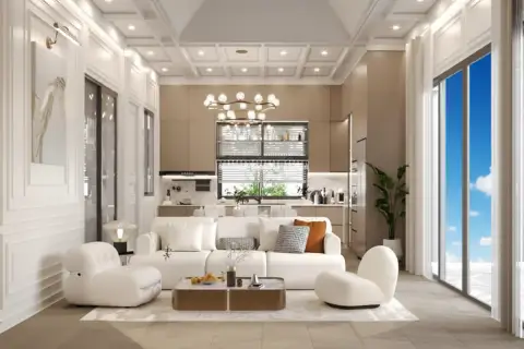 Larelana Villa spacious living room with white sofas, coffee table, and view into the modern kitchen area.
