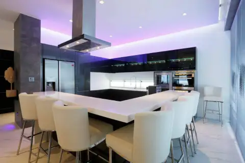 8 Bedroom House for Sale in Pratumnak Hill modern kitchen with white island counter and purple ambient lighting