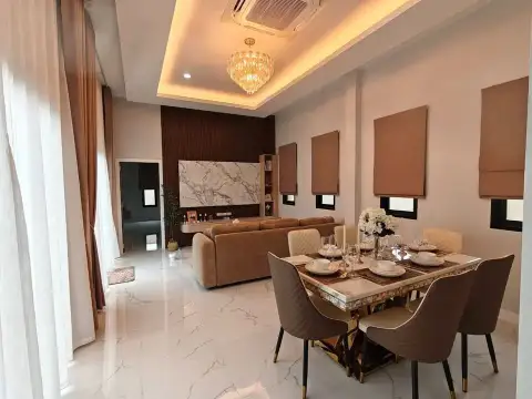 3 Bedroom House for Sale in Mabprachan open-plan living and dining area with chandelier and marble flooring