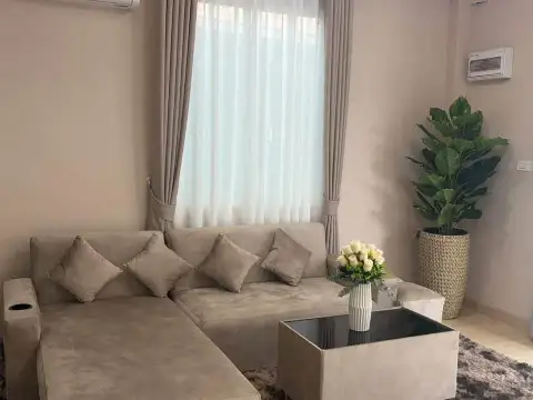 3 Bedroom House for Sale in Mabprachan living room with beige sectional sofa and sheer curtains