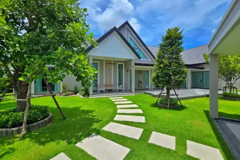 4 Bedroom House for Sale in Mabprachan front garden with stone pathway leading to covered entrance