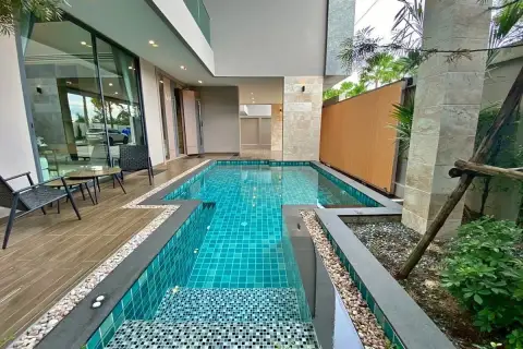 4 Bedroom House for Sale & Rent at Madcha Nirvana private pool with wooden deck and outdoor seating area