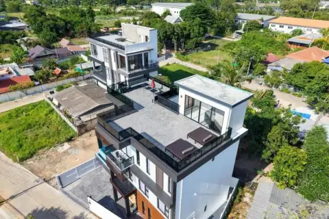 5 Bedroom House for Sale & Rent in Na Jomtien rooftop terrace with lounge seating and panoramic neighborhood view