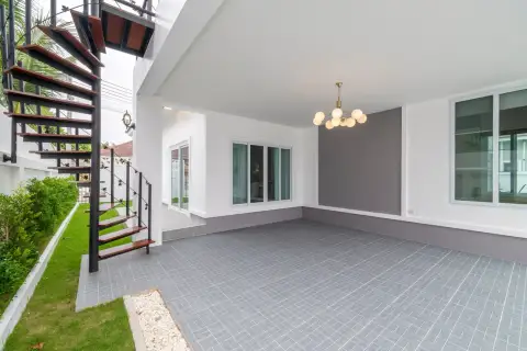 3 Bedroom House for Sale in Nong Pla Lai covered carport patio with spiral staircase and garden