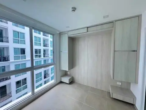 1 Bedroom Condo for Sale at Olympus City Garden built-in wardrobe nook with window overlooking courtyard