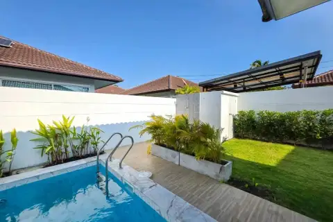 3 Bedroom House for Sale at Panalee Village backyard pool deck with garden lawn and outdoor shower