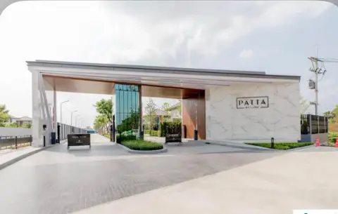 3 Bedroom House for Sale at Patta Define community entrance gate with marble sign and glass canopy