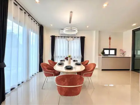 4 Bedroom House for Rent at Patta Element modern U-shaped kitchen with white countertops and built-in stove