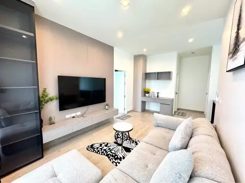 4 Bedroom House for Rent at Patta Element open living and dining area with marble coffee table and chandelier