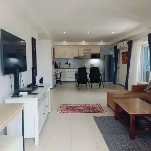 1 Bedroom Condo for Sale & Rent at Pattaya Hill Resort open-plan living room with kitchen and dining area