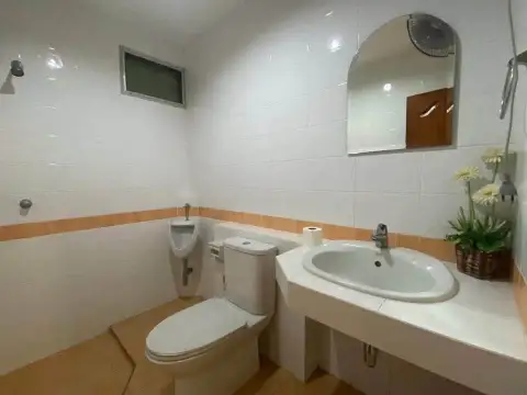3 Bedroom House for Sale in Pattaya - bathroom with sink, mirror, and urinal fixture
